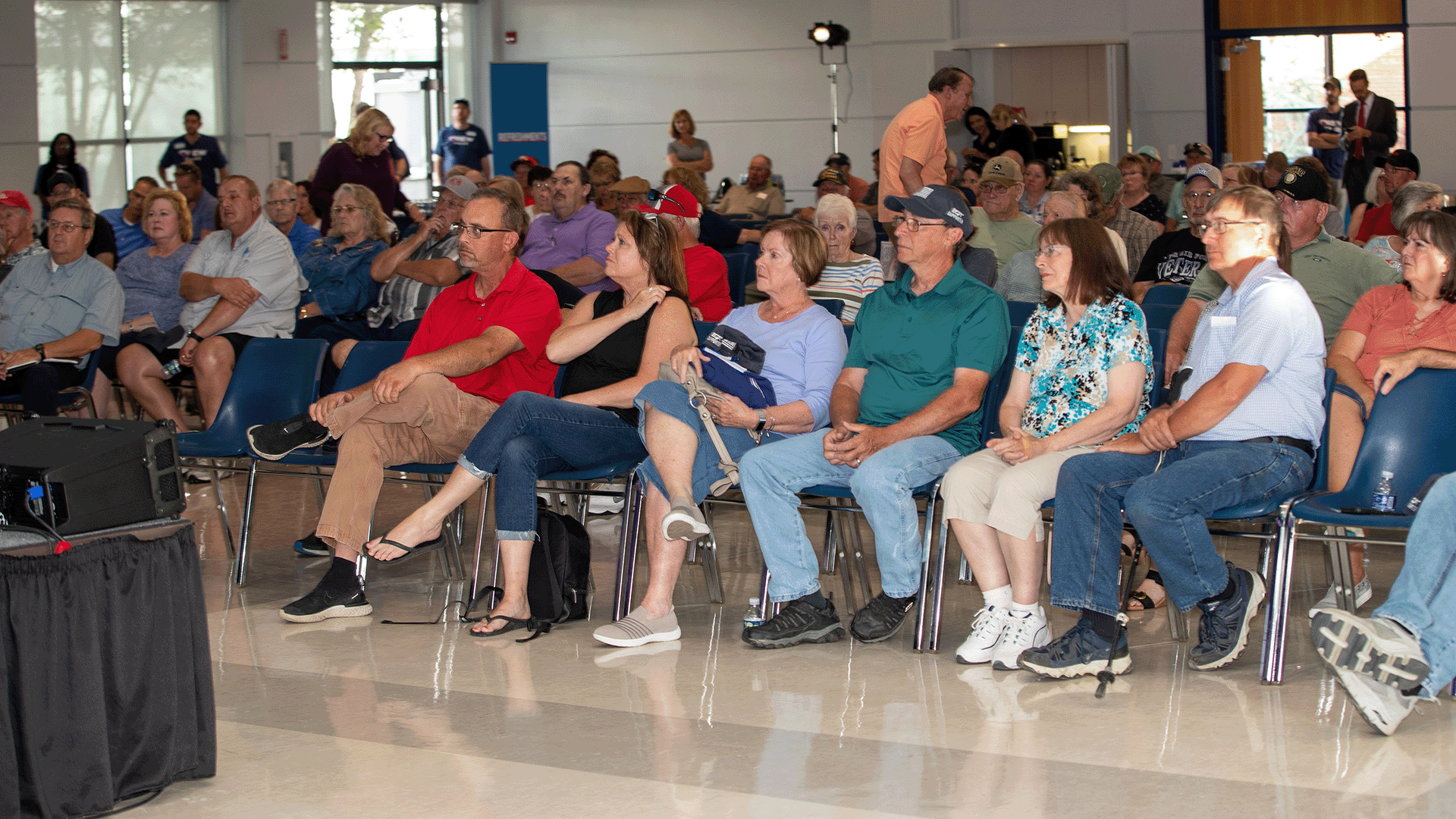 Crowd of people at a EQT speaking event
